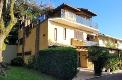 Casa em condomínio fechado com 4 quartos para alugar na avenida juca batista, 1490, cavalhada, porto alegre, 400 m2 por r$ 6.200