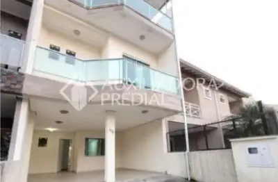 Casa em condomínio fechado com 3 quartos para alugar na Rua Pau Brasil, 419, Hípica, Porto Alegre, 140 m2 por R$ 3.800