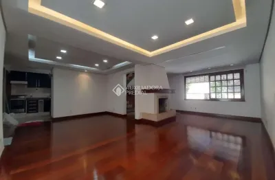 Casa em condomínio fechado com 3 quartos para alugar na Rua Doutor Armando Barbedo, 166, Tristeza, Porto Alegre, 293 m2 por R$ 4.850