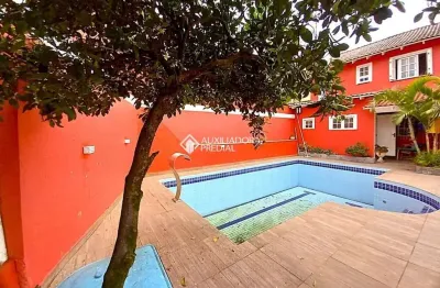 Casa em condomínio fechado com 4 quartos para alugar na Rua Amapá, 796, Vila Nova, Porto Alegre, 270 m2 por R$ 4.200
