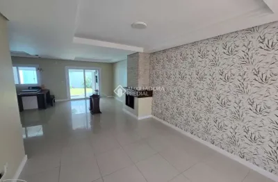 Casa em condomínio fechado com 3 quartos para alugar na Rua Eroni Soares Machado, 43, Hípica, Porto Alegre, 220 m2 por R$ 5.000