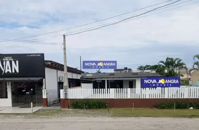 Imóvel comercial (salão mais sala comercial com casa de frente para a rodovia)