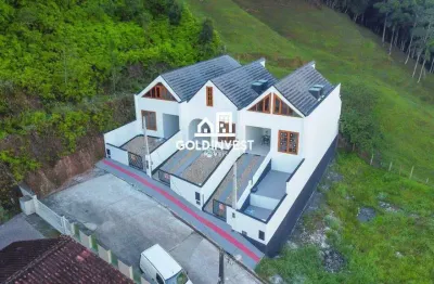 Casa estilo chalé com amplo espaco e 3 quartos (2 suíte) no bairro nova brasília