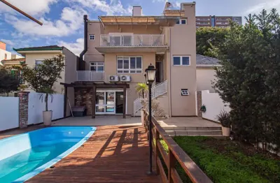 Casa em condomínio fechado com 4 quartos para alugar na rua luzitana, 1098, higienópolis, porto alegre por r$ 13.500