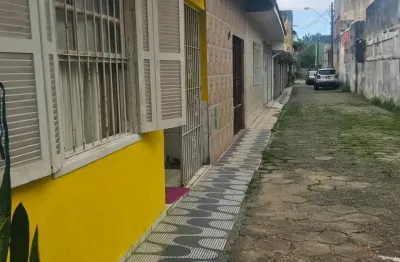 Casa com vaga de garagem em vila caiçara, praia grande