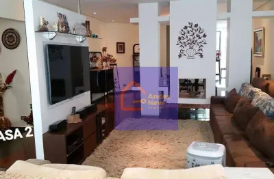 Magnífico sobrado em local nobre, com 4 suítes, escritório, duas varandas, sala ampla com lareira, lavabo, garagem  para 6 autos.