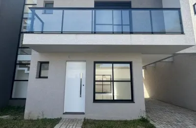 Sobrado triplex com terraço em condomínio à venda no bacacheri