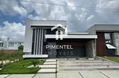 Casa na região da ponta negra com 03 suítes (sendo a master com closet) | sala com pé direito duplo | cozinha americana com ilha e piscina