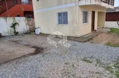 SOBRADO DOIS DORMITÓRIOS COM GARAGEM A 50 metros da AVENIDA PRINCIPAL NA PRAIA DOS INGLESES R$ 650.000,00