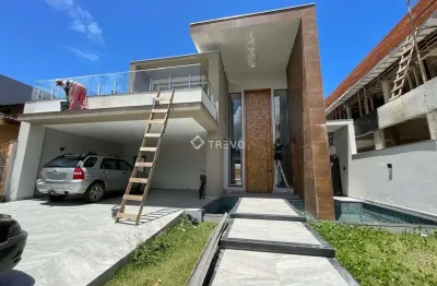 Casa em condomínio fechado à venda com 4 dorm/5 wc/4 vagas em bertioga/sp