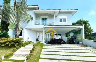 Casa à venda com 560m², 4 suítes e 4 vagas por r$ 2.800.000,00 - cond. reserva santa maria – jandira/sp