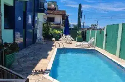 Incrível oportunidade de sobrado mobiliado em condomínio localizado no bairro martim de sá em caraguatatuba!