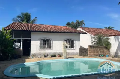Excelente imóvel com piscina para locação localizado no bairro jardim britânia em caraguatatuba!