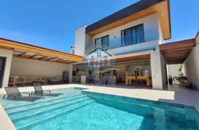Incrível sobrado novo de alto padrão situado em condomínio frente mar, na praia da lagoinha em ubatuba-sp!