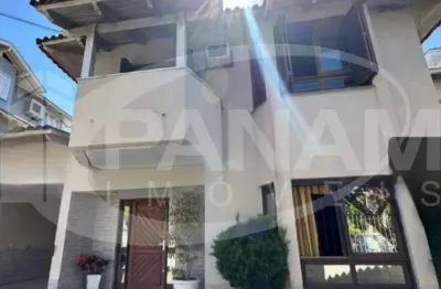 Casa com 3 quartos à venda na avenida ecoville, 209, sarandi, porto alegre por r$ 890.000