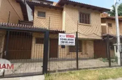 Casa com 3 quartos à venda na avenida senador daniel krieger, 224, jardim itu sabará, porto alegre por r$ 790.000
