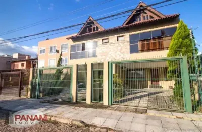 Casa com 3 quartos à venda na rua dom jaime de barros câmara, 711, sarandi, porto alegre por r$ 990.000