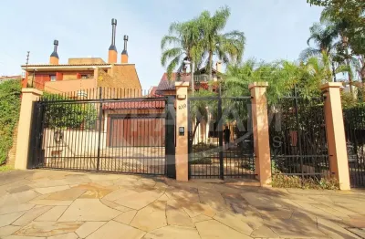 Casa com 4 quartos à venda na rua doutor barbosa gonçalves, 610, chácara das pedras, porto alegre por r$ 2.990.000