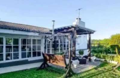 Casa em condomínio fechado com 3 quartos à venda na lomba do vadeco, 825, morada gaúcha, gravataí por r$ 1.390.000
