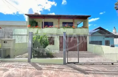 Casa com 3 quartos à venda na rua professor josé maria rodrigues, 58, vila ipiranga, porto alegre por r$ 1.140.000