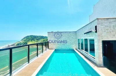 Cobertura duplex decorada à venda na praia da enseada