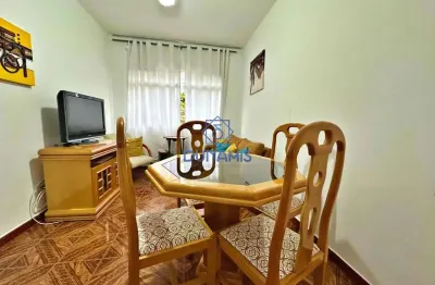 Apartamento conservado próximo a praia das astúrias - com vaga de garagem