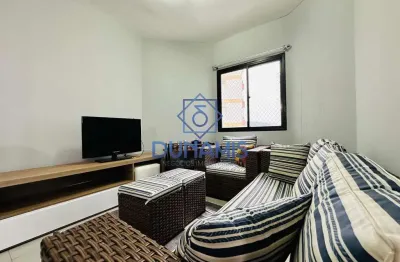 Apartamento reformado com sacada na praia das astúrias, área nobre do guarujá