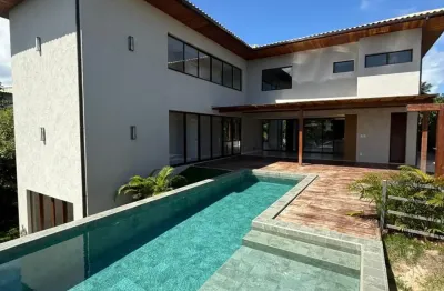 Casa alto padrão à venda no condomínio praia bella em praia do forte , bahia.