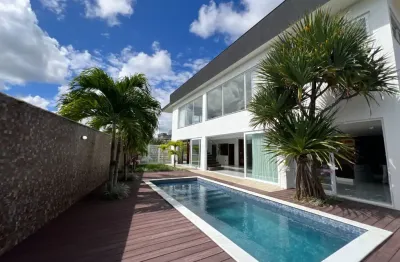 Casa sofisticada 4/4 suítes com energia solar para venda no alphaville litoral norte iii