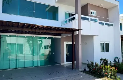 Casa com energia solar 4/4 suítes 01 master semi mobiliada para locação em buraquinho