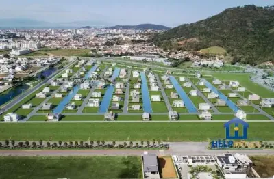 Terreno em condomínio fechado à venda na avenida deltaville, 01, deltaville, biguaçu por r$ 253.000