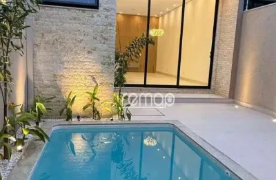 Casa alto padrão Parque Universitário com 3 suites e piscina aquecida