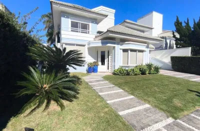 Casa com 4 quartos para alugar na rua dos cumurupis, 45, jurerê internacional, florianópolis, 300 m2 por r$ 22.000