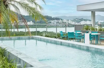 Apartamento com 2 quartos para alugar na Rodovia Haroldo Soares Glavan, 975, Cacupé, Florianópolis, 67 m2 por R$ 6.500