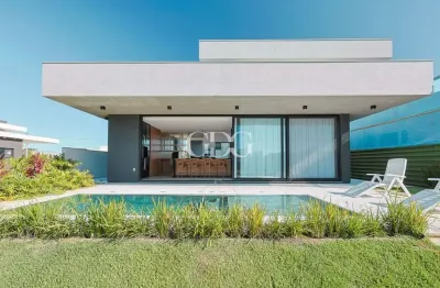 Casa térrea à venda no condomínio reserva das águas, em torres-rs.