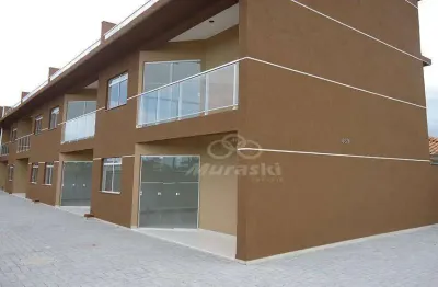 Sobrado com 3 dormitórios à venda, 80 m² por R$ 579.000,00 - Coroados - Guaratuba/PR