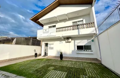 Casa com 4 dormitórios à venda, 294 m² por r$ 1.180.000,00 - centro - guaratuba/pr