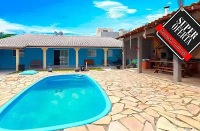 Casa com 2 dormitórios à venda, 152 m² por R$ 619.000,00 - Brejatuba - Guaratuba/PR
