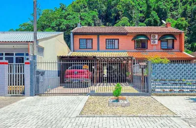 Casa com 3 dormitórios à venda, 111 m² por R$ 650.000,00 - Centro - Guaratuba/PR