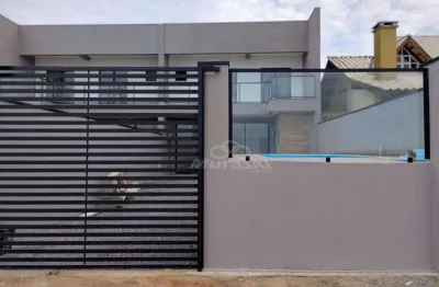 Sobrado com 3 dormitórios à venda, 221 m² por R$ 1.680.000,00 - Brejatuba - Guaratuba/PR