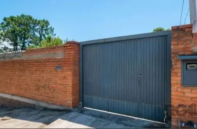 Casa com 3 quartos à venda na Rua Oswaldo Olmiro Machado, Ipanema, Porto Alegre