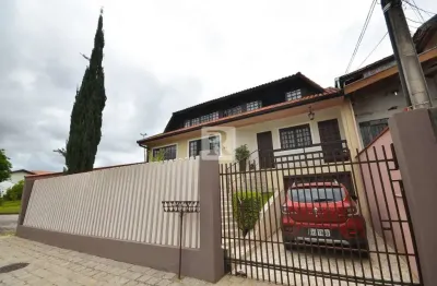 Casa com 3 quartos à venda na alexandre dalcuch, 156, bacacheri, curitiba por r$ 1.100.000