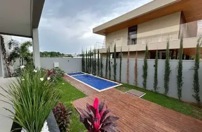 Sobrado á venda de alto padrão em condomínio fechado-anápolis, com 4 suítes e 332 metros de construção!