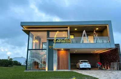 Sobrado costa serena,  a beira do lago, condomínio beira mar com 04 suites  mobiliado