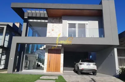 Sobrado  beira de lago condomínio fechado mobiliado e decorado com 4 suites