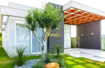 Casa em condomínio fechado com 4 suítes mobiliada/decorada com piscina