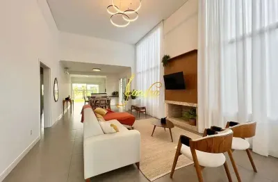Excelente casa no condomínio riviera estilo contemporânea! composta por 4 suítes, sendo 2 americanas,