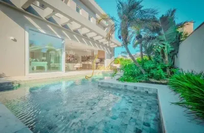 Sobrado em condomínio fechado com 05 suites mobiliado e decorado