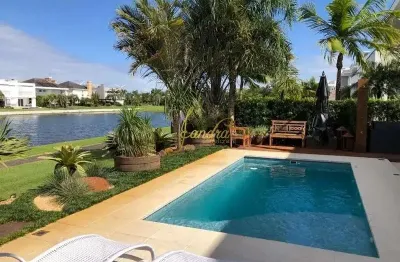 Sobrado beira de lago  com piscina aquecida com 05 suítes