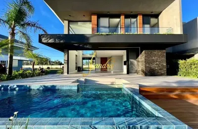Sobrado no condomínio malibu 5 suítes, home office  e piscina e lounge
